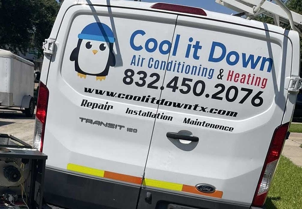 A Cool It Down branded service van at a Katy home